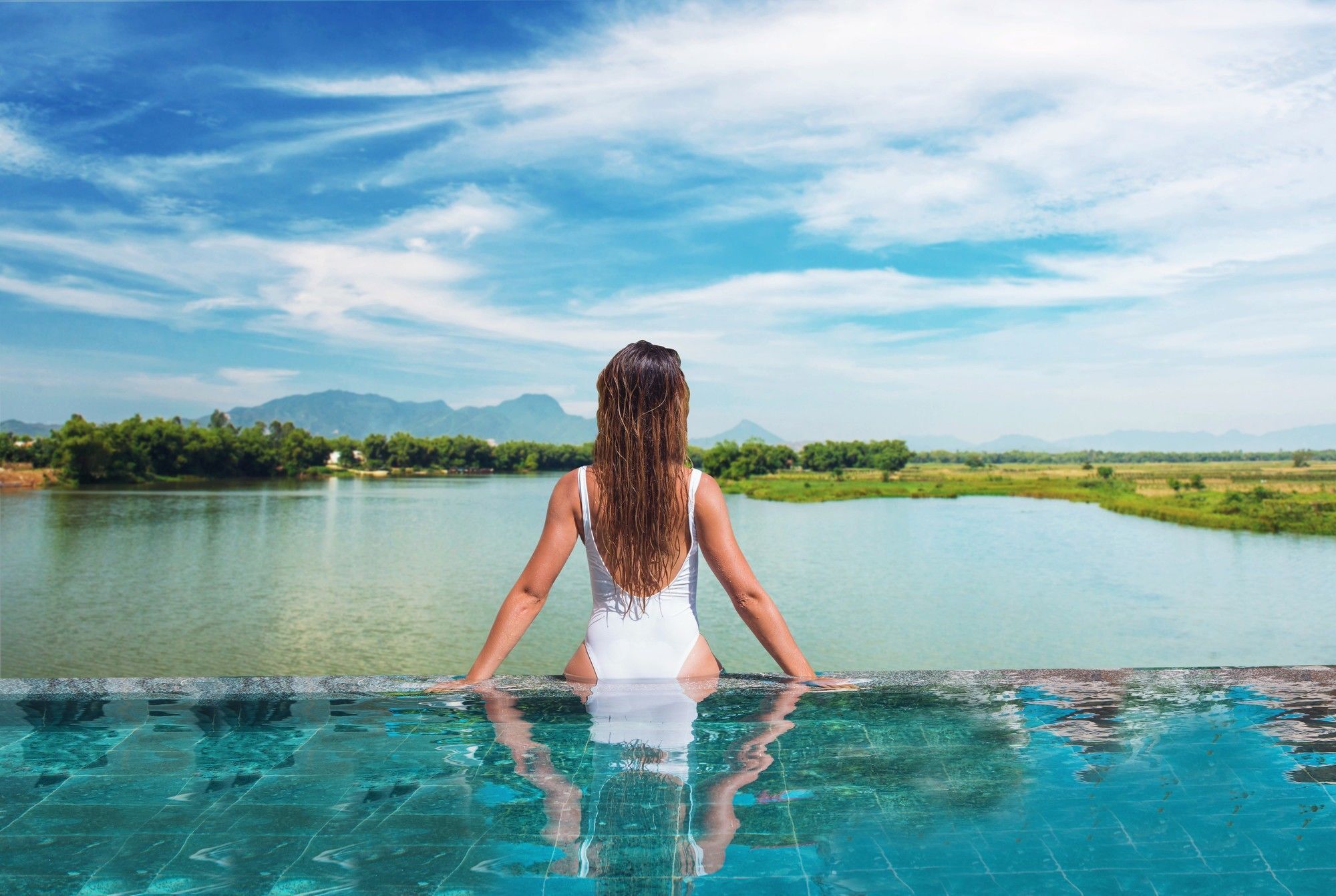 Little Riverside Hoi An . A Luxury Hotel & Spa Экстерьер фото A woman in a swimsuit